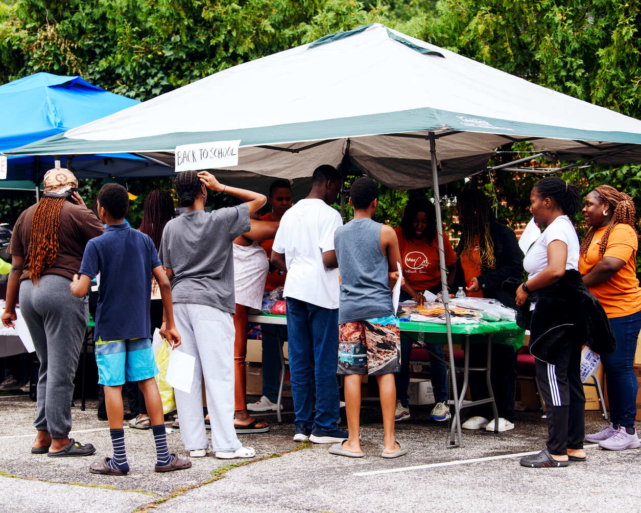 Volunteers distributing groceries