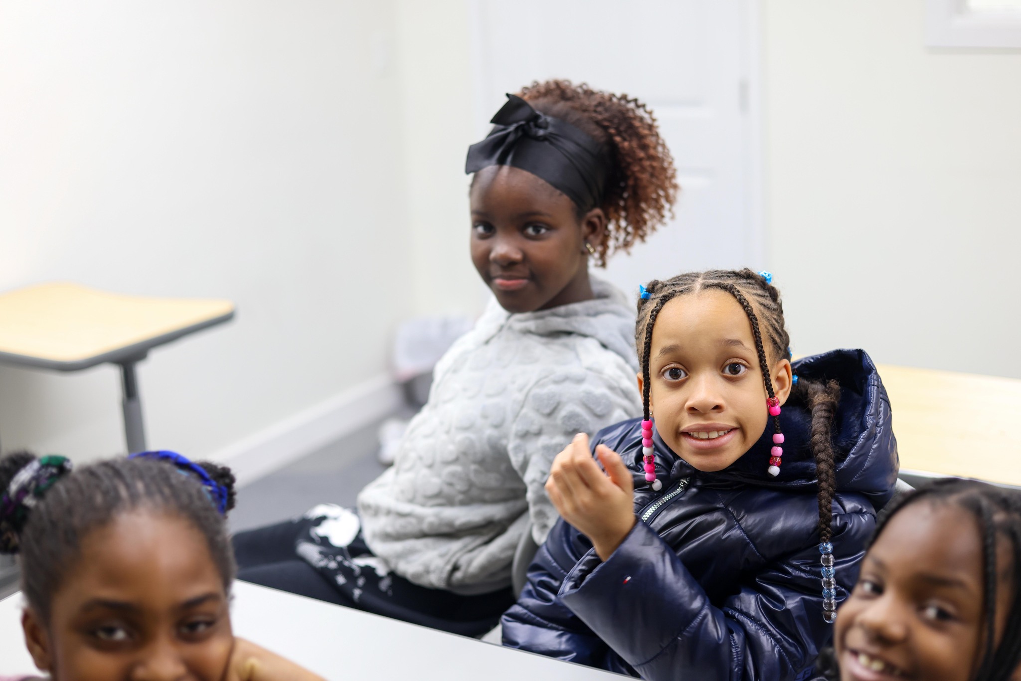 Children engaged in learning at Mercy Kidz classroom